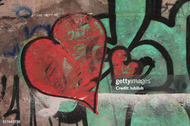 red graffiti hearts on old wall - love concept - an old mistress stock pictures, royalty-free photos & images