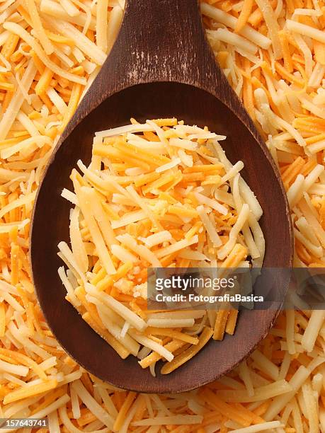 mixed grated cheeses - grated stock pictures, royalty-free photos & images