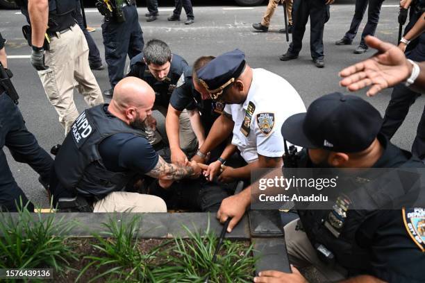 New York Police Department team take popular YouTube and Twitch broadcaster Kai Cenat and some attendees into custody as police intervene attendees...