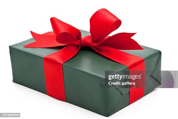 green gift box with red bow - christmas present isolated stock pictures, royalty-free photos & images