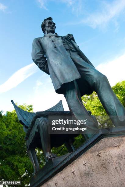 "standing lincoln" statue in chicago, il - lincoln park stock pictures, royalty-free photos & images