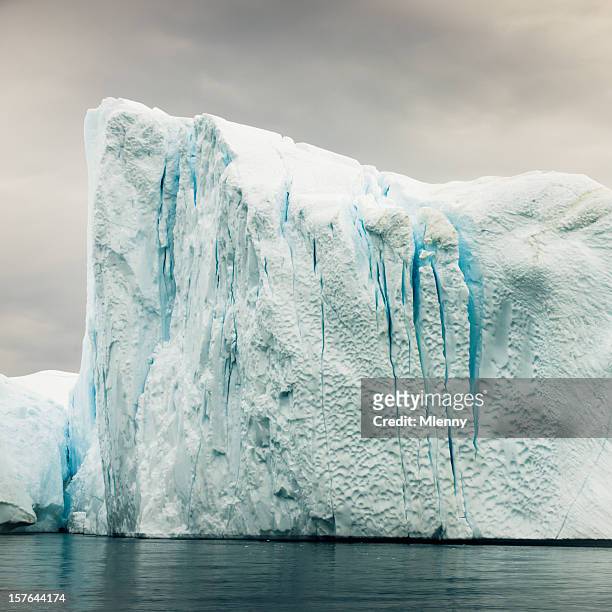 arctic iceberg from calving glacier west greenland - glacier calving stock pictures, royalty-free photos & images
