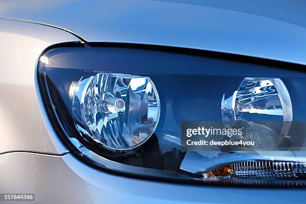 car headlight close up - halogen light stock pictures, royalty-free photos & images