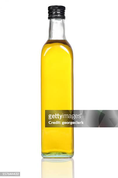 olive oil bottle close-up - lots of bottles stockfoto's en -beelden