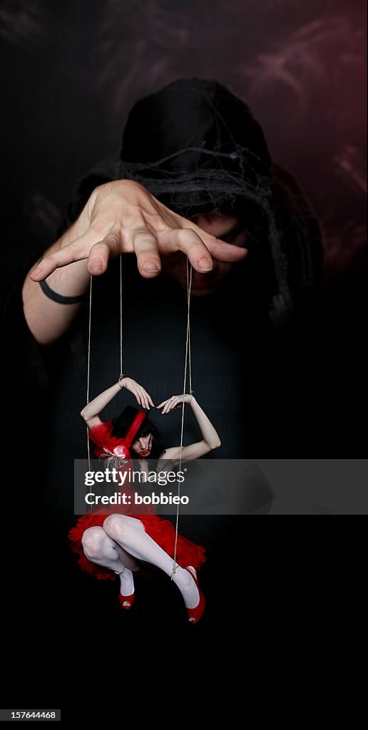 Evil Puppeteer High-Res Stock Photo - Getty Images