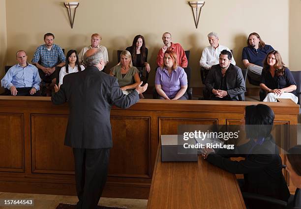 lawyer addressing the jury - jury box stock pictures, royalty-free photos & images