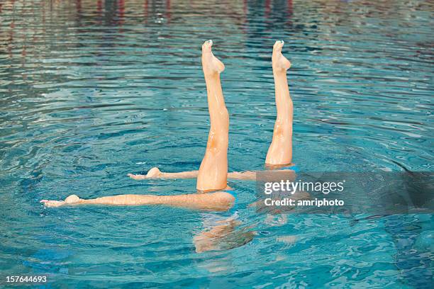 perfect synchronized swimming - artistic swimming stock pictures, royalty-free photos & images