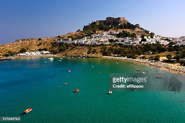 lindos beach and acropolis - rhodes,_new_south_wales stock pictures, royalty-free photos & images