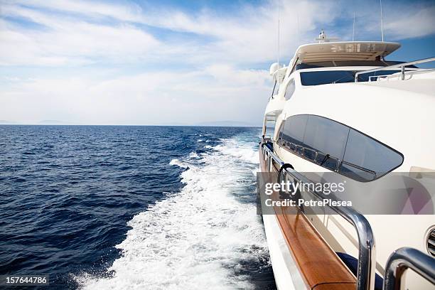 luxury yacht sailing at sea - luxury yachts stockfoto's en -beelden