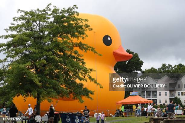 The world's largest rubber duck is seen on the water near the wharf in Leonardtown, Maryland, on August 4, 2023. The 61-foot tall, 63.9-foot wide,...