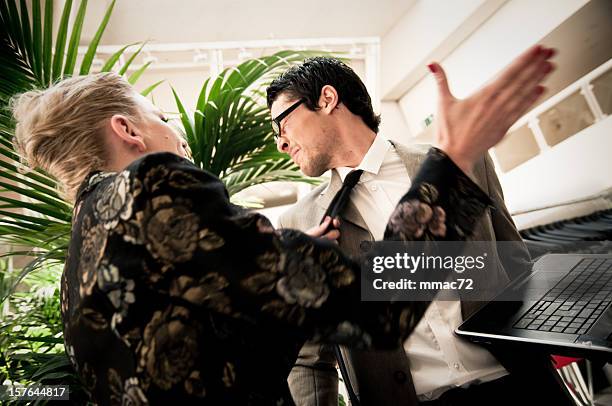 angry business woman slams coworker - pets stockfoto's en -beelden