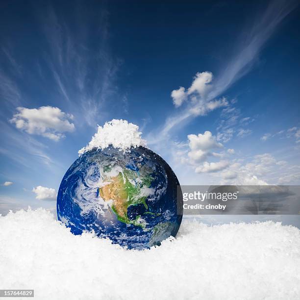 earth in the snow - earth ice melt stock pictures, royalty-free photos & images