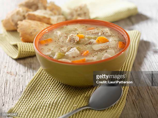 chunky chicken noodle soup with crusty bread - chicken soup stock pictures, royalty-free photos & images