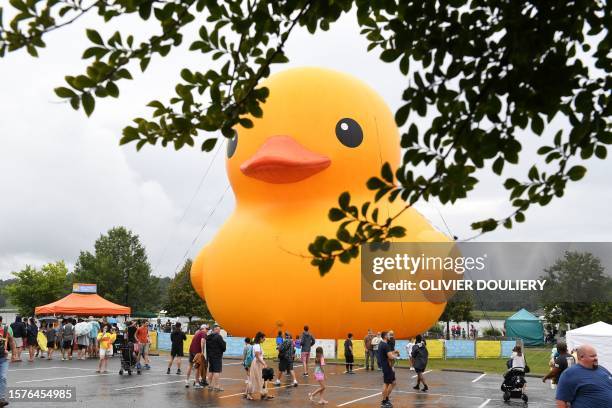 The world's largest rubber duck is seen on the water near the wharf in Leonardtown, Maryland, on August 4, 2023. The 61-foot tall, 63.9-foot wide,...