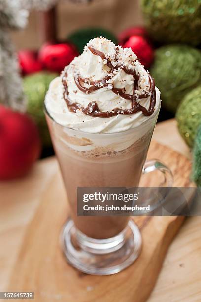 indulgent festive hot chocolate - chocolate sauce stock pictures, royalty-free photos & images