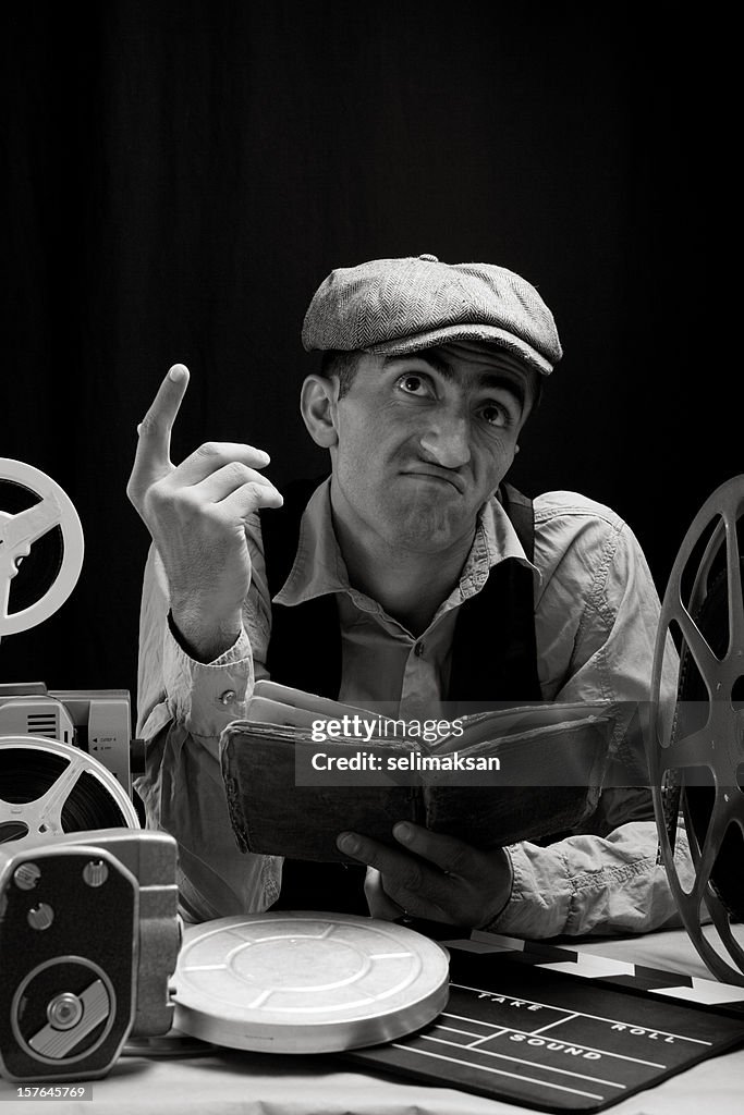 Black And White Portrait Of Man Reading Script For Practicing