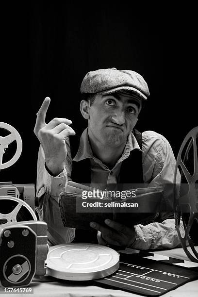 black and white portrait of man reading script for practicing - 8mm film projector stock pictures, royalty-free photos & images