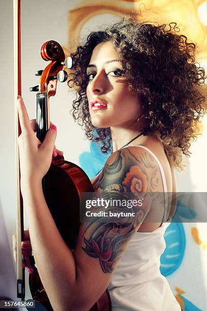 tattooed violinist - classical musician stock pictures, royalty-free photos & images