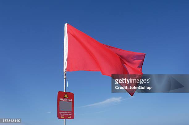 warning flag - red flag warning stock pictures, royalty-free photos & images
