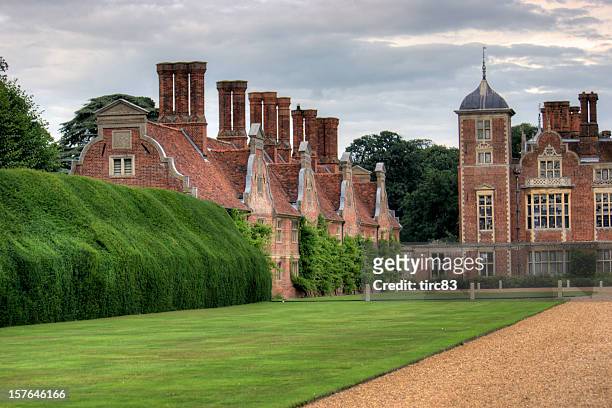 english country mansion and turrets - country house stock pictures, royalty-free photos & images