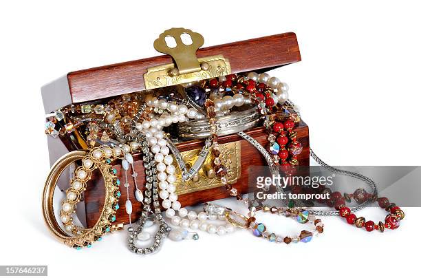 overflowing jewelry box - gold brooch stock pictures, royalty-free photos & images