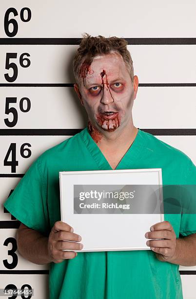 mugshot of a zombie - halloween zombie makeup stock pictures, royalty-free photos & images