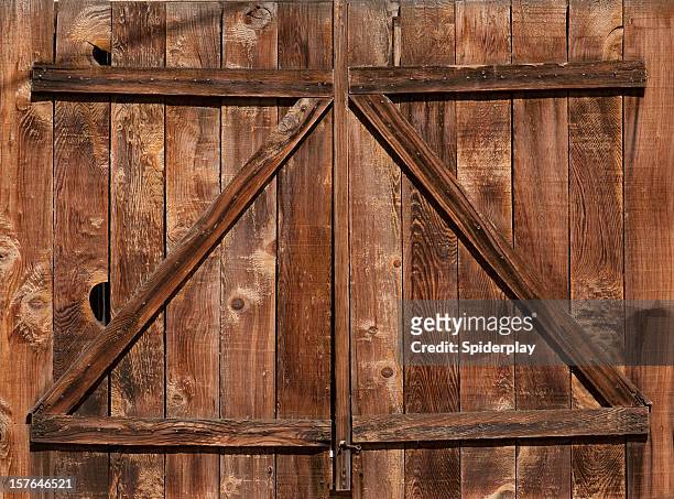 weathered barn door - barn stock pictures, royalty-free photos & images