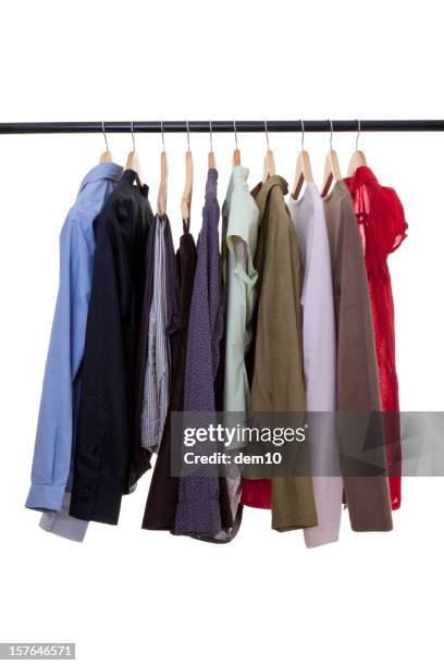 clothes on rack in store - clothes rack stock pictures, royalty-free photos & images