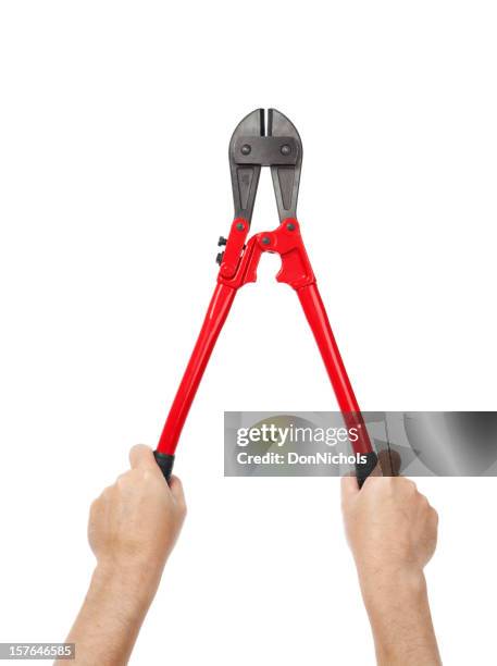 hands holding bolt cutters - bolt cutter stock pictures, royalty-free photos & images