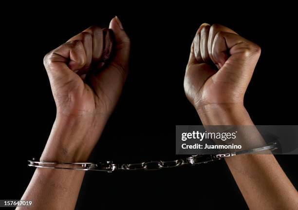 handcuffed hands - kidnapping stock pictures, royalty-free photos & images