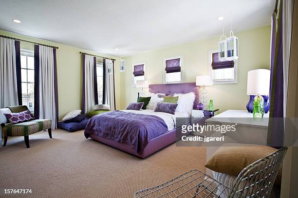 a modern mismatch bedroom design photo - upholstered furniture stock pictures, royalty-free photos & images