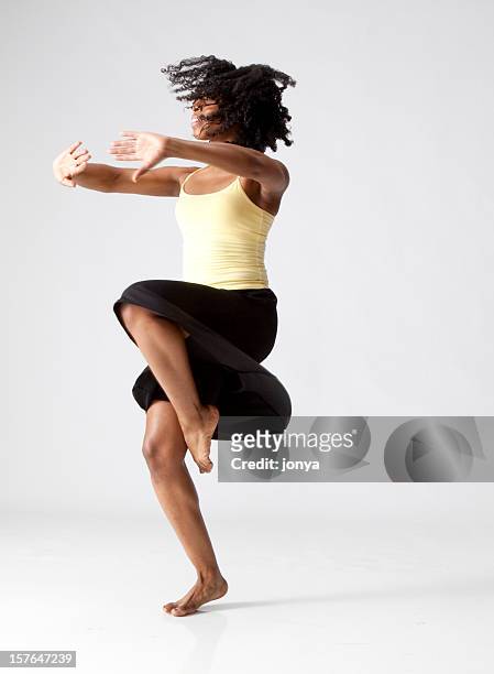 modern dancer twirling - jazz dancing stock pictures, royalty-free photos & images