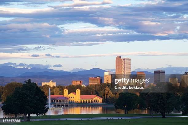 denver city park and skyline with a cloudy sky - denver sunrise stock pictures, royalty-free photos & images