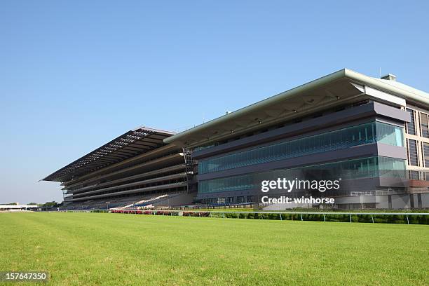 horse racing track - horse racecourse stock-fotos und bilder