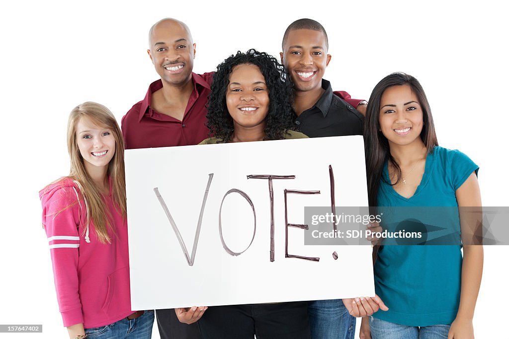 Diverse Group of Young Adults Holding Vote Sign