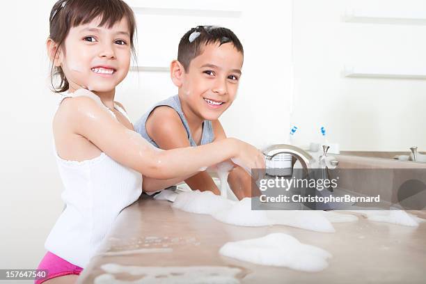 kids washing hands - brothers bathroom bildbanksfoton och bilder