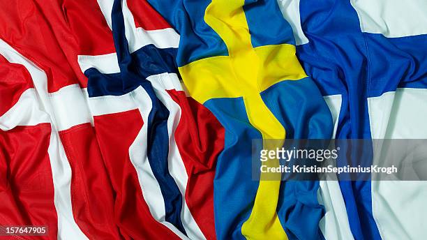 nordic flags - flying flags stock pictures, royalty-free photos & images