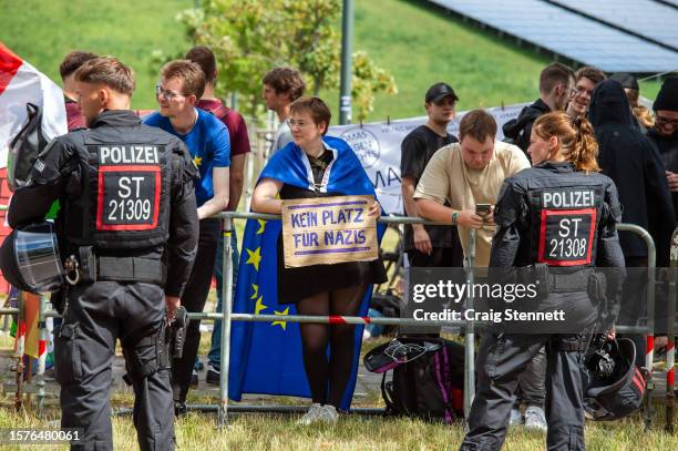 Protester holds an anti-AfD placard outside the conference centre during the 2023 Federal Congress of the right-wing Alternative for Germany...