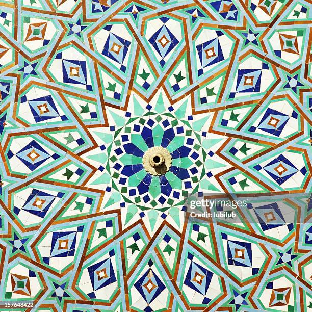 colorful tiles on fountain of mosque hassan ll, casablanca, morocco - moroccan tile stock pictures, royalty-free photos & images