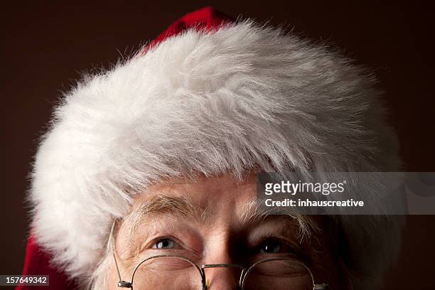 pictures of real santa claus looking up - santa beard stock pictures, royalty-free photos & images