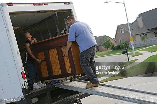 piano moving - piano stock pictures, royalty-free photos & images