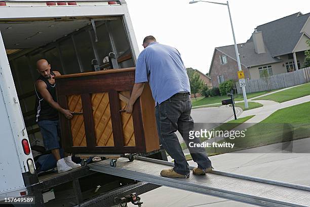 piano moving - piano stock pictures, royalty-free photos & images