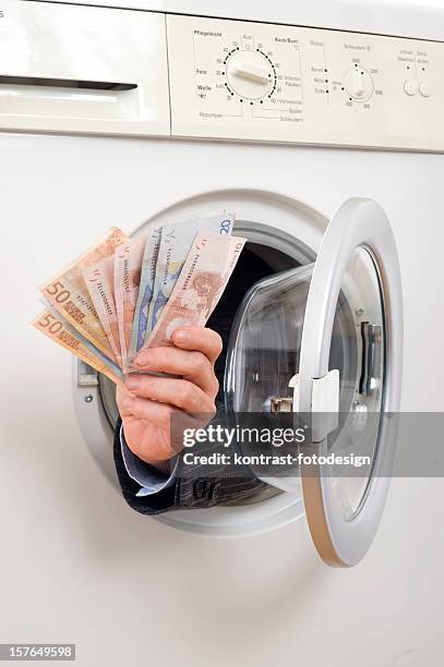 money laundry - money laundery stock pictures, royalty-free photos & images