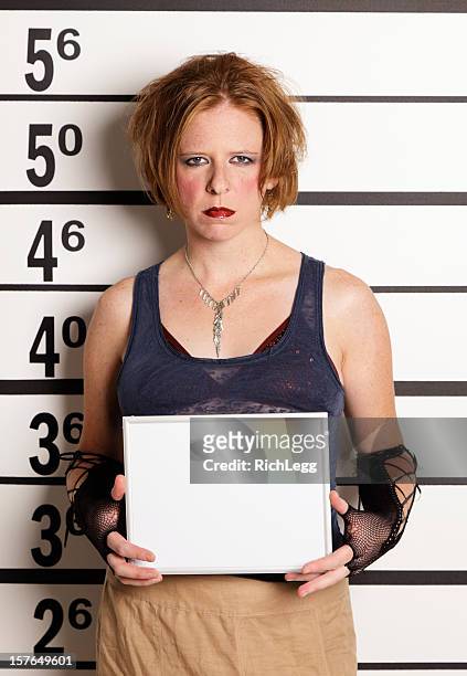mugshot of a woman - arrest warrant stock pictures, royalty-free photos & images