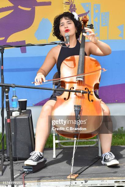 Ana Carla Maza performs backstage for Radio Womad during Day 2 of the Womad Festival at Charlton Park on July 28, 2023 in Malmesbury, England.