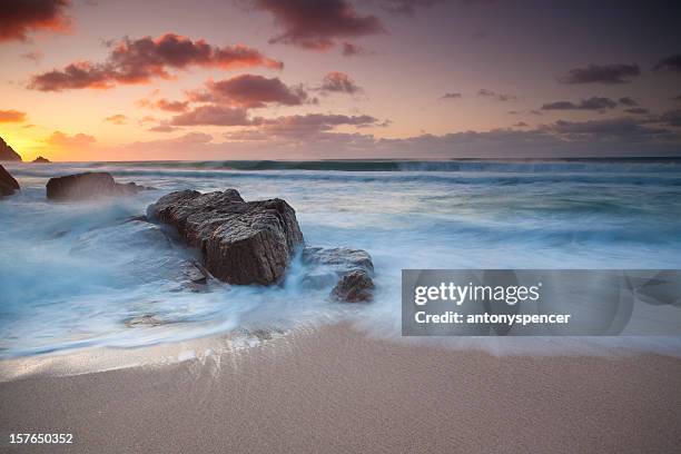 porthcurno winter sunrise - lands end cornwall stock pictures, royalty-free photos & images
