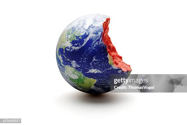 bitten earth world globe. exploitation environment concept - missing bite stock pictures, royalty-free photos & images