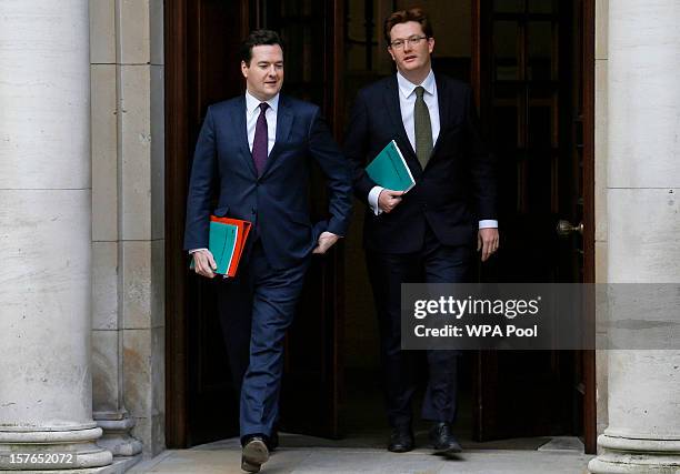 George Osborne, Chancellor of the Exchequer and Danny Alexander, the Chief Secretary to the Treasury leave the Treasury to deliver the half-yearly...