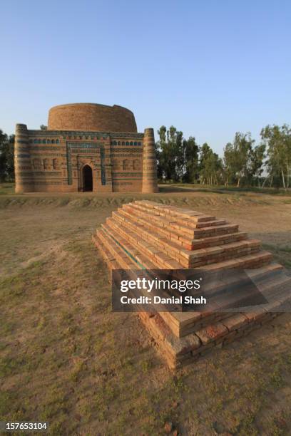 squared blue and red tiled grave and tomb symmetry - dera ismail khan stock pictures, royalty-free photos & images