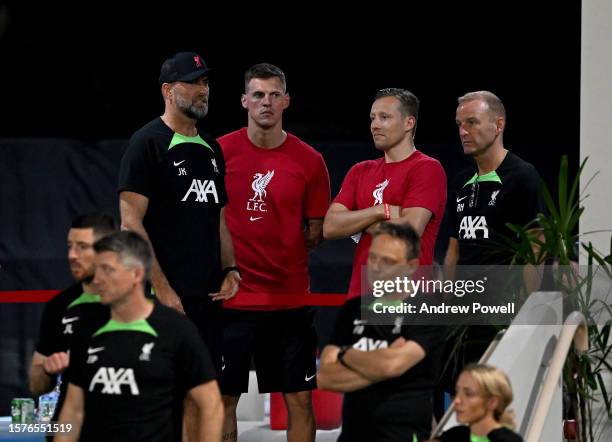 Jurgen Klopp manager of Liverpool talking with Martin Skrtel and Lucas Leiva Liverpool Legends during a training session on July 28, 2023 in...